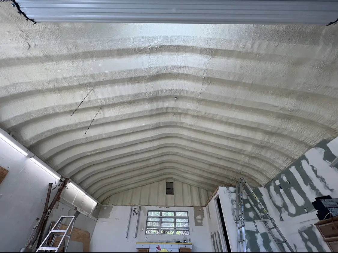 Spray polyurethane foam applied to the underside of a metal roof deck in Little Ferry